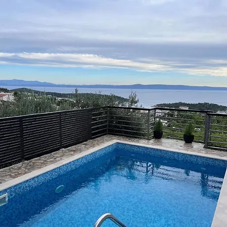Ferienhaus Mit Beheiztem Pool, Terrasse Mit Meerblick Und Sonnenliegen Holiday home